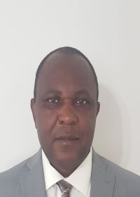 A headshot of Kenneth Pasiah