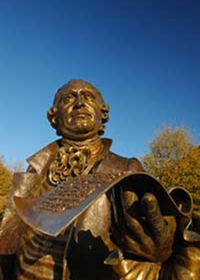 A photo of the the bronze George Mason statue 