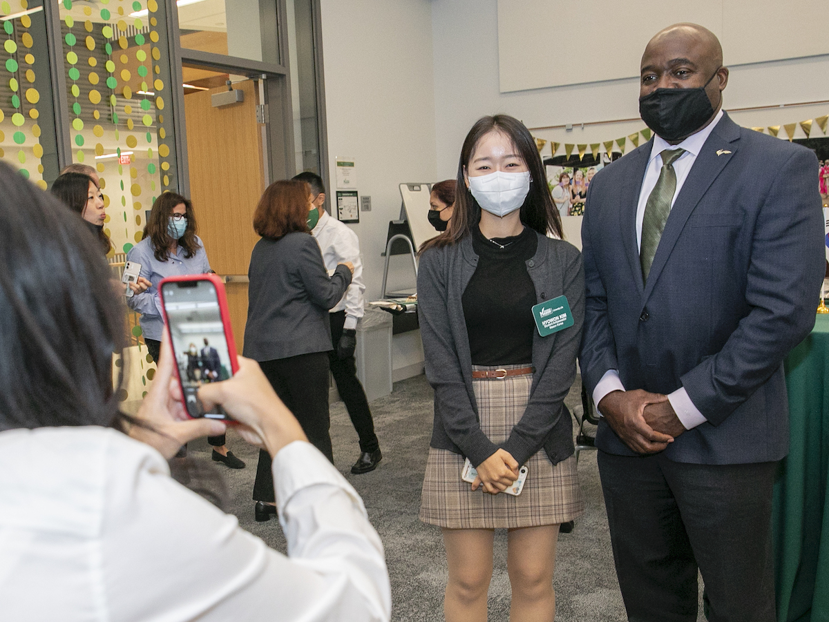 Mason Korea student Hyowon Kim poses with President Gregory Washington during one of the Investiture receptions.
