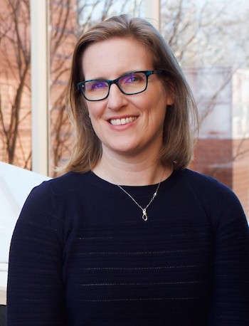 Heather Vough in front of window