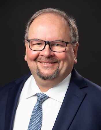portrait of a man with glasses