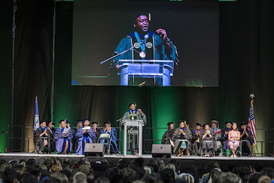 people on stage in eaglebank arena