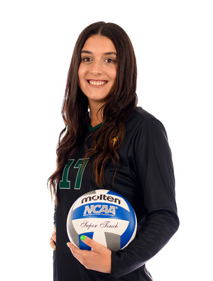 young woman holding a volleyball