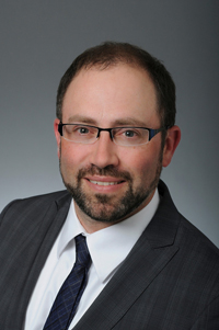 A headshot of William Rosenberger