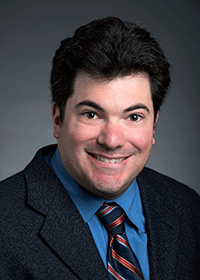 A headshot of Kenneth Strazzeri