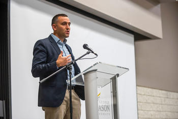 Trevor Montano takes the stage as a keynote speaker at the Alpha Challenge